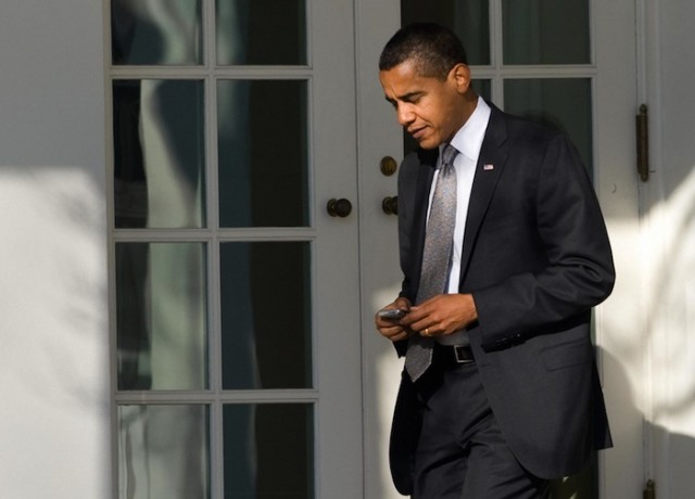 US President Barack Obama uses his Black