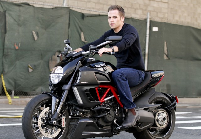 Chris Pine riding a Ducati motorcycle on the set of his new movie, 'Jack Ryan' in Manhattan