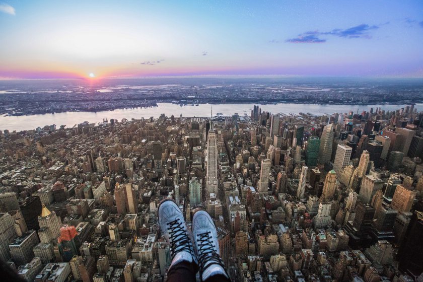 PIC BY @MISSHATTEN / CATERS NEWS - (PICTURED: New York City.)  Forget selfies, belfies and dronies... One company is offering a variation of the popular snapshot - thousands of feet above the New York skyline. Aerial photography company FlyNYON are giving snappers the chance to take stomach-churning pictures of their limbs, hanging out of a helicopter above famous New York landmarks. The shot - known by the company as a "shoe selfie - has become a huge hit, with legs being snapped over the likes of the Empire State Building, Central Park, Times Square and Freedom Tower. Thanks to the help of social media, FlyNYON, who are based in Kearney, NJ, have seen interest in the experience boom. SEE CATERS COPY