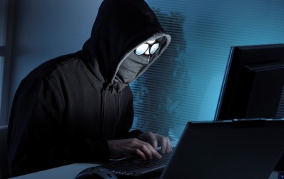 Hacker stealing data from computer