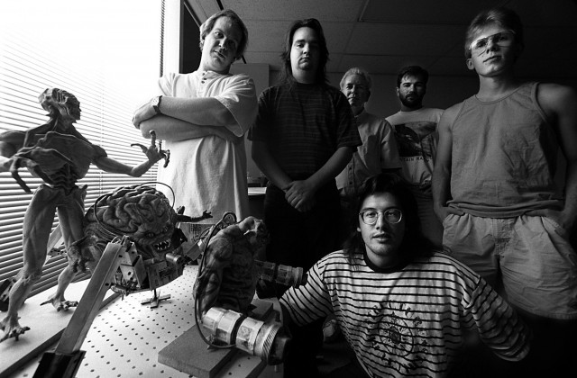 ORG XMIT: [NZ_16DOOM ] Headline: Caption: 8/16/94-Clockwise from top left: Jay Wilbur, business manager, Adrian Carmack, artist/founder, Bobby Prince, music/sound engineer, Kevin Cloud, artist, John Carmack, lead programmer/founder and John Romero, game developer/founder of Id Software makers of the highly popular, action-packed 3-D virtual reality software game called, 'DOOM.' DOOM II is scheduled to be released October 10th. The figures at left are creatures from the game. Photographer: Title: Credit: City: State: Country: Date: ObjectName: NZ_16DOOM CaptionWriter: Special: Category: SupCat1: SupCat2: SupCat3: Source: Keyword: NZ_16DOOM Keyword: 72878 Keyword: David Leeson Keyword: DOOM Keyword: Id Software Keyword: John Romero Keyword: John Carmack Keyword: Kevin Cloud Keyword: Bobby Prince Keyword: Adrian Carmack Keyword: Jay Wilbur Keyword: 8/16/94