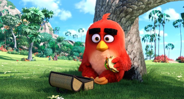 Red (Jason Sudeikis) enjoys lunch alone in the park in Columbia Pictures and Rovio Animation's ANGRY BIRDS.