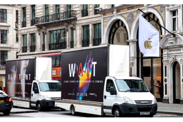 Huawei-parks-P20-ad-trucks-before-Apple-and-Samsung-stores-trolls-them-with-a-Renaissance-graffiti