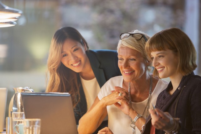 Businesswomen talking in office meeting